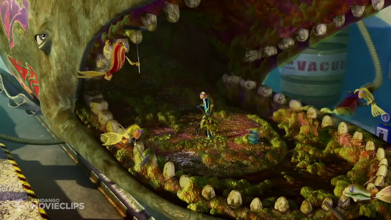 A fish getting a deep tooth polish at a cleaning station